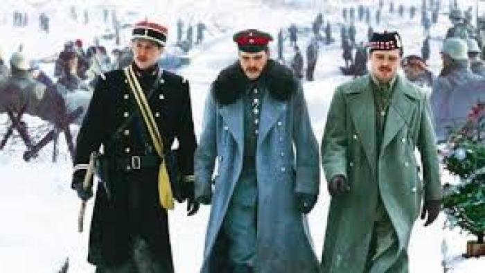 Joyeux Noel: Three soldiers walk outside in snow
