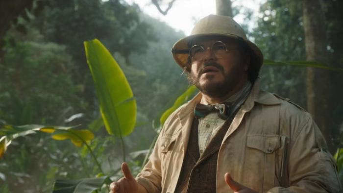 Jumanji: Open World Movie: Jack Black stands in a jungle setting