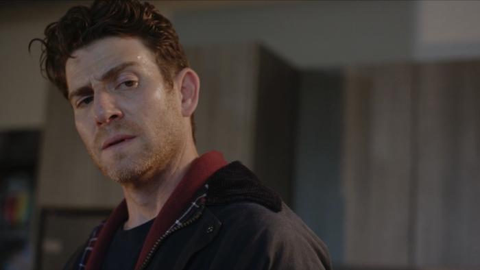 Junction Movie: Sweating and disheveled, Michael (Bryan Greenberg) has a suspicious look on his face