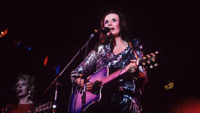 June: June Carter Cash performs.