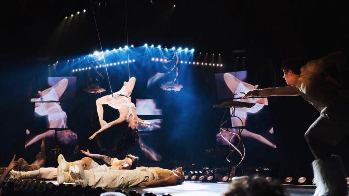 Katy Perry: The Lifetimes Tour - Live from Paris movie: Katy Perry sings upsides down on a wire suspended above the stage