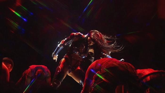 Katy Perry: The Lifetimes Tour - Live from Paris movie: Katy Perry throws her hair in front of her face as she dances on stage