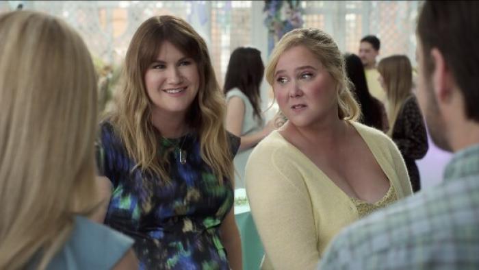 Kinda Pregnant: Amy Schumer and Jillian Bell at a party.