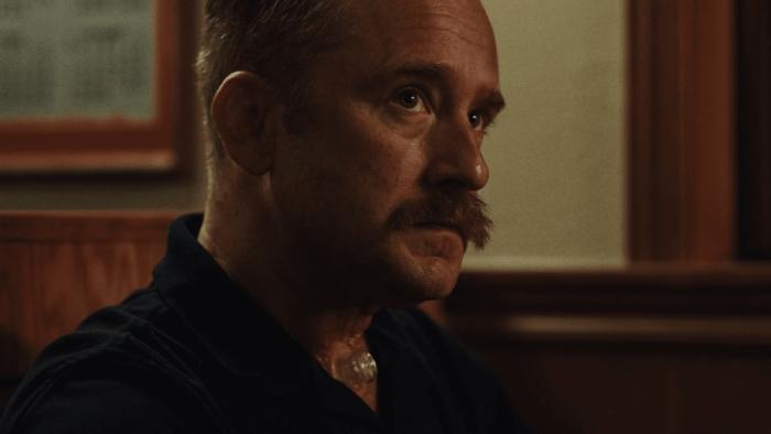 King Ivory Movie: In a diner, George "Smiley" Greene (Ben Foster) looks up at someone who's just arrived