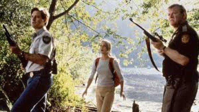 Lake Placid Movie: Characters outside, 2 with guns