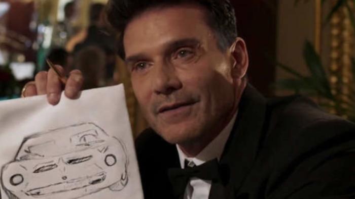 Lamborghini: The Man Behind The Legend: A middle-aged Italian man holds a sketch of a new sports car design