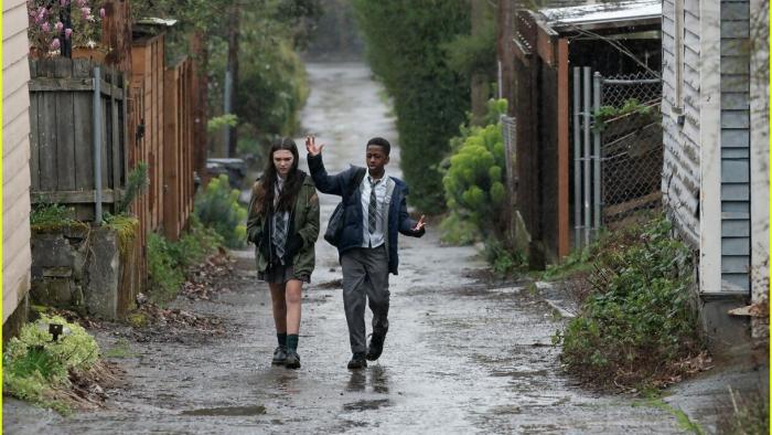 Little Wing: Brooklynn Prince and Che Safari walk down an alley.