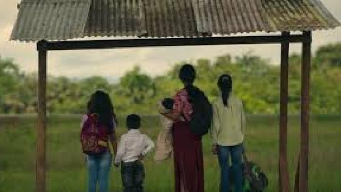 The Lost Children: Back of 4 kids outside