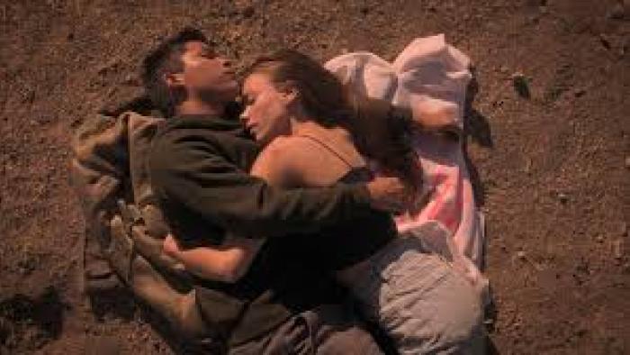 Lost in the Night: Couples embraces and sleeps on the ground