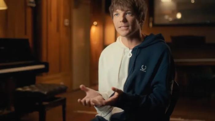 Louis Tomlinson -- All of Those Voices: Louis Tomlinson sits in a studio talking