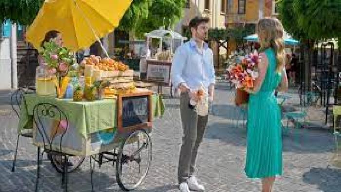 Love on the Right Course: Man and woman have a conversation by a flower cart