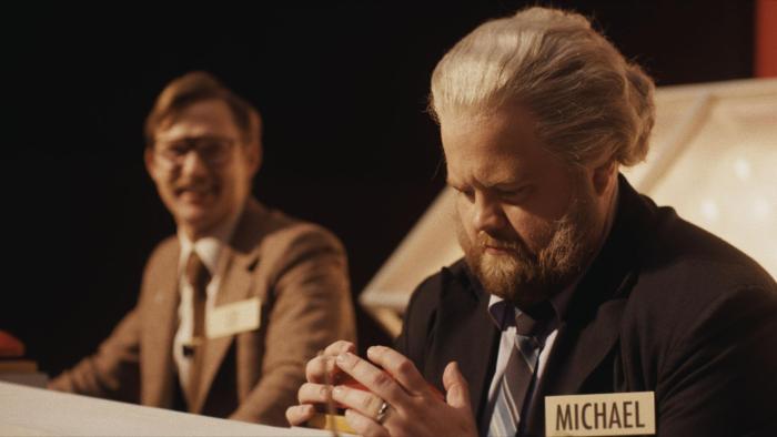 The Luckiest Man in America Movie: On the game show, Michael Larson looks down worriedly at his hands