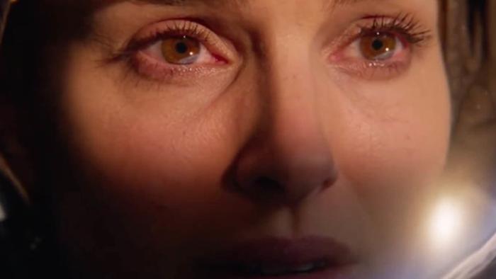 Lucy in the Sky Movie: Lucy Cola's eyes in closeup behind her astronaut's helmet