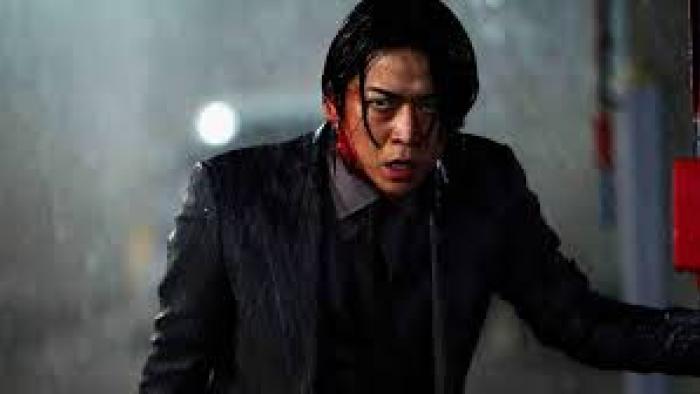 Lumberjack the Monster: Asian man in the rain
