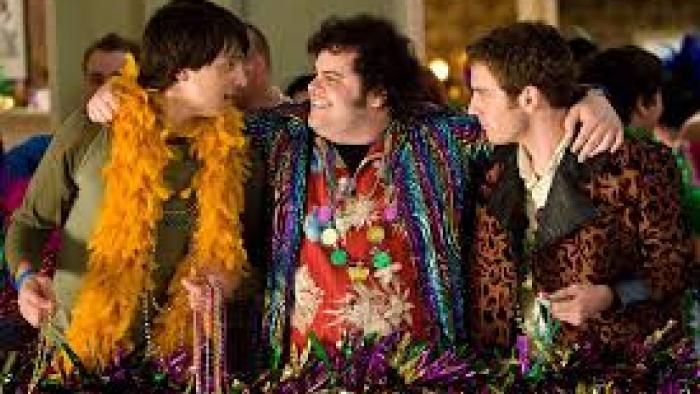 Mardi Gras: Spring Break: Josh Gad and other young men in boas