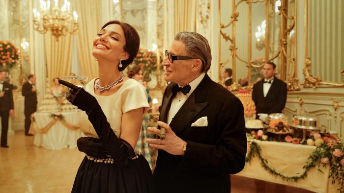 Maria movie: Angelina Jolie and Haluk Bilginer laugh at a black-tie reception