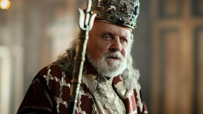 Mary: Anthony Hopkins wears a crown and holds a sceptre as he stands in a palace corridor