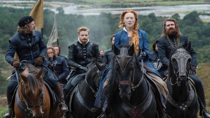 Mary Queen of Scots Movie: Mary Stuart riding in a group through the countryside