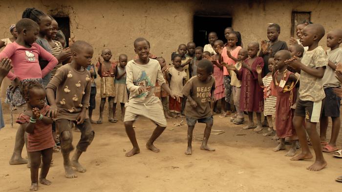 Masaka Kids: A Rhythm Within: Children dancing.