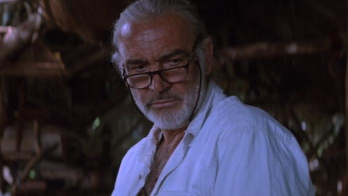 Medicine Man: Sean Connery sits in hut