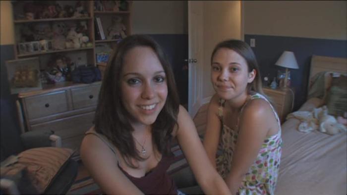 Megan Is Missing Movie: Megan and Amy look at the viewer while sitting in a bedroom