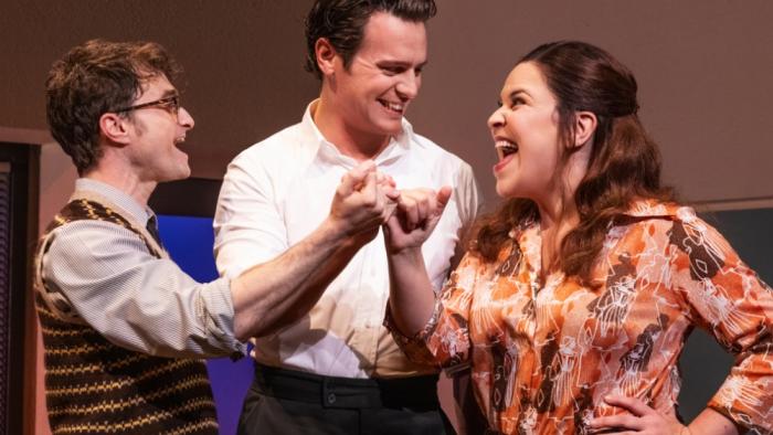 Merrily We Roll Along movie: Daniel Radcliffe, Jonathan Groff, and Lindsay Mendez smile and sing at each other
