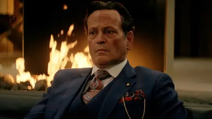 Mike & Nick & Nick & Alice: Vince Vaughn sits in front of a fireplace.