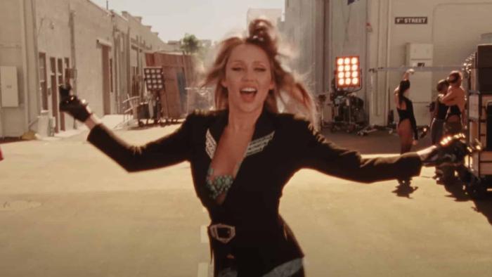 Miley Cyrus: Something Beautiful: Miley dances.
