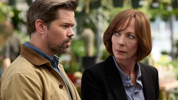 Miss You, Love You: Allison Janney and Andrew Rannells sit on a bench outside