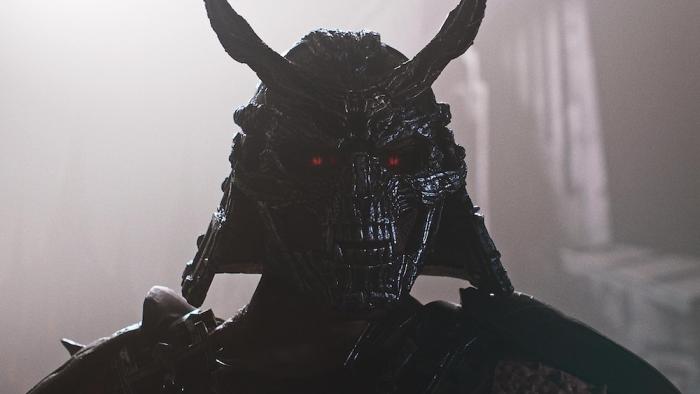 Mortal Kombat II Movie: Hidden behind a fearsome black skull mask, the villainous Shao Kahn plots his latest evil scheme