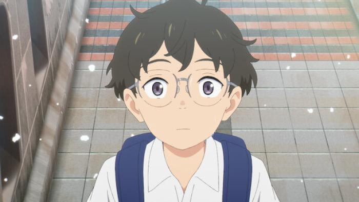 My Oni Girl movie: Japanese boy in white shirt and backpack looks straight ahead