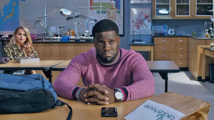 Night School Movie: Teddy sits at his desk for night classes