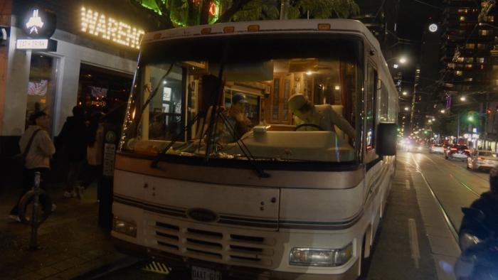 Nirvanna the Band the Show the Movie Movie: Jay and Matt are seen through the front window of an RV that's parked on the sidewalk