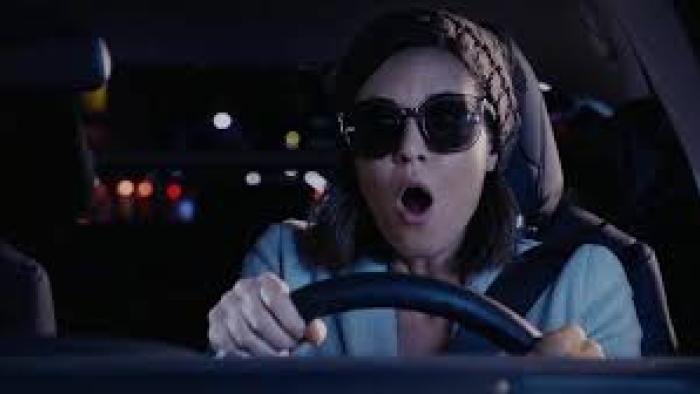 No Sleep Til Christmas: Odette Annable drives and looks worried
