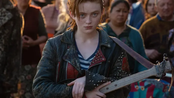 O'Dessa: Sadie Sink with guitar.