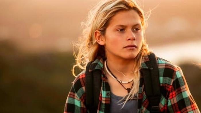 Ocean Boy: Teenager Rockit stands and looks to the right