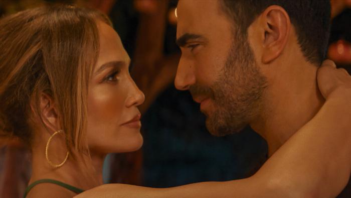 Office Romance: Jennifer Lopez and Brett Goldstein embrace.