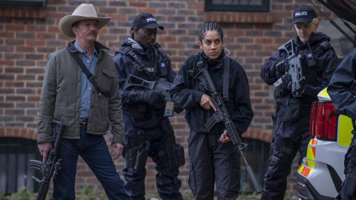 One Ranger Movie: Texas Ranger Alex Tyree (Thomas Jane), British Intelligence Agent Jennifer Smith (Dominique Tipper), and two police officers prepare to enter a building, on the trail of the terrorists