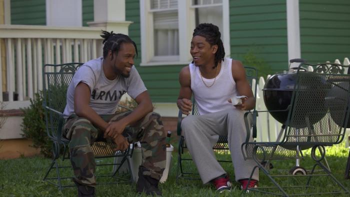 One Spoon of Chocolate Movie: Unique and Ramsee sit in chairs on a lawn, talking and laughing
