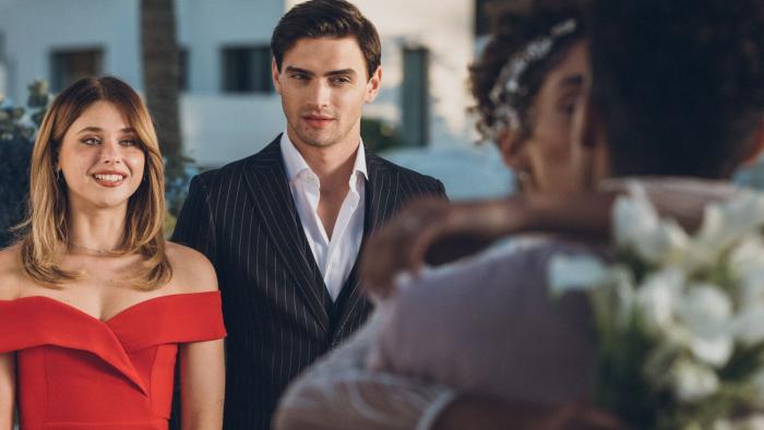 Our Fault: Nicole Wallace and Gabriel Guevara at a wedding.