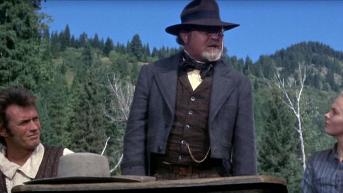 Paint Your Wagon: Three people in 1800s clothes, two men and a young blond haired woman