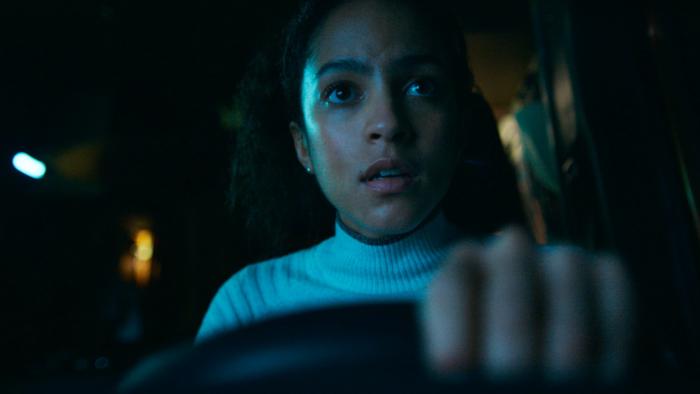 Passenger Movie: At night, Maddie is at the wheel of the van, driving with a scared, determined look