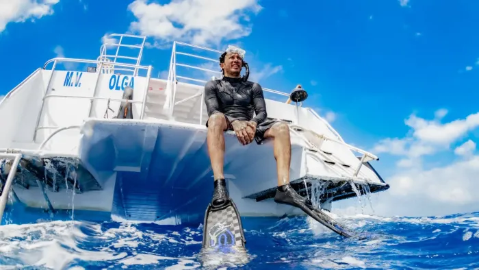 Patrick and the Whale: Patrick Dykstra on a boat.