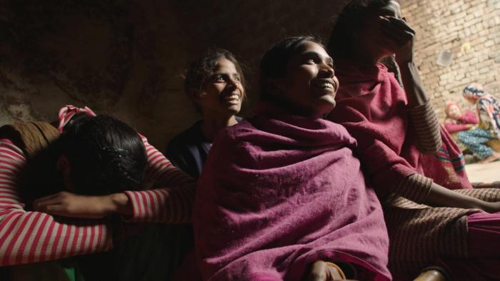 Period. End of Sentence Movie: A group of smiling girls