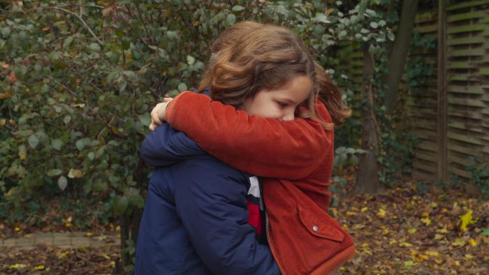 Petite Maman: Joséphine Sanz and Gabrielle Sanz hugging