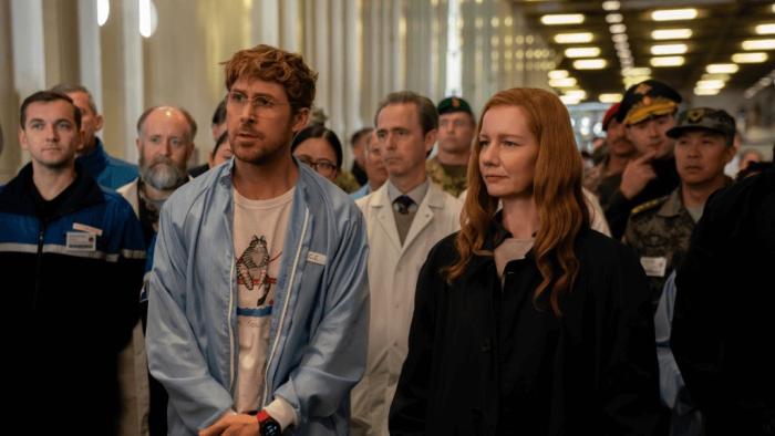 Project Hail Mary movie: Grace (Ryan Gosling), Stratt (Sandra Hüller), and various personnel