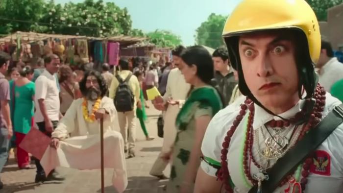 PK: PK the alien stares at things around him with a look of shock