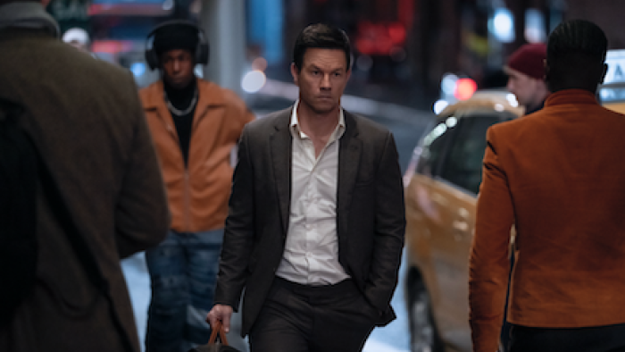 Play Dirty: Mark Wahlberg on a city street.