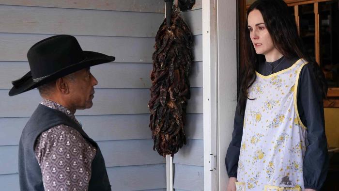 Please Don't Feed the Children: Michelle Dockery answers the door.