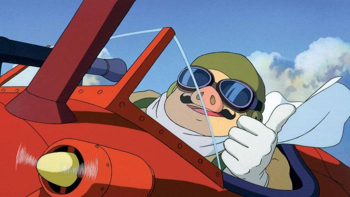 Porco Rosso Movie: A pilot in pig form sits in a plane cockpit